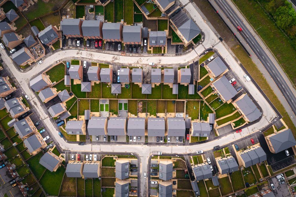 Aerial view directly above a new build housing estate in the UK